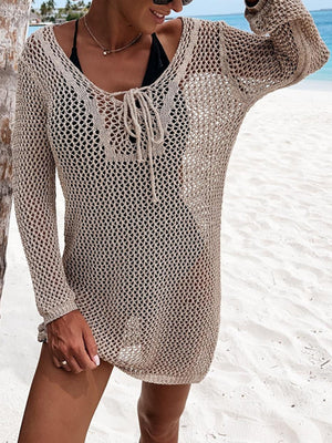 Khaki open-knit beach dress with lace-up neckline and long sleeves.