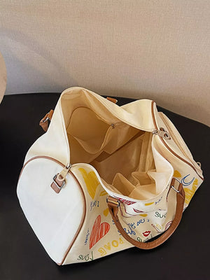 Vibrant canvas duffel bag with colorful heart print and brown trim, open view.