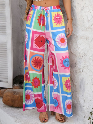 Geometric print wide-leg trousers with drawstring waist and multicolor sun pattern