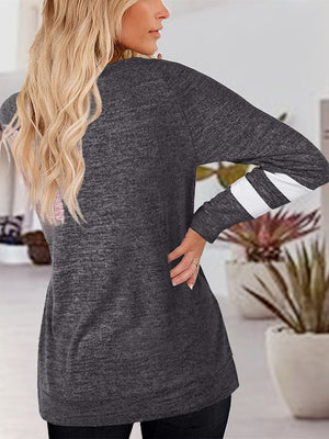 Chic Vibe Raglan T-Shirt in Charcoal with white striped sleeves and a subtle graphic detail on the back.