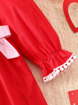 Children's Bow Long Sleeve Dress in Red, model styling view