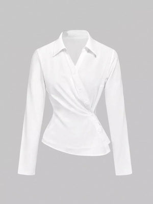 White asymmetrical button front long-sleeve collared shirt with a draped detail.