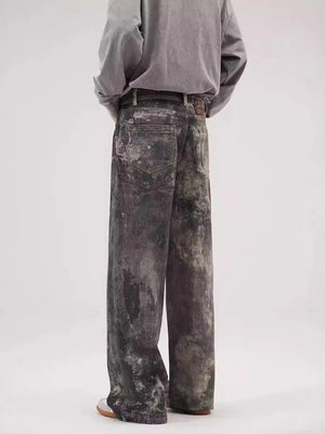 Dark gray wide-leg jeans with distressed details and a relaxed fit.