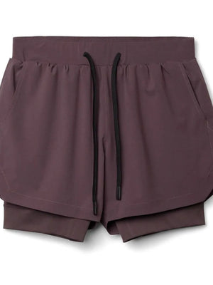 Layered performance shorts in plum purple with drawstring and perforated panels.