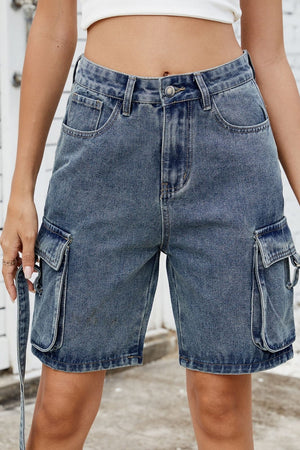 Medium blue denim cargo shorts with straps and utility pockets.