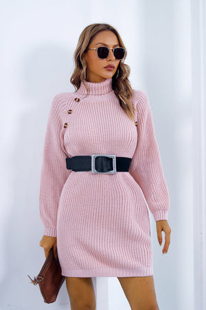 Pink knit turtleneck mini dress with button detail and black belt