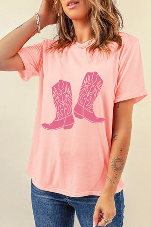 Blush pink graphic tee with cowboy boot print and round neck.