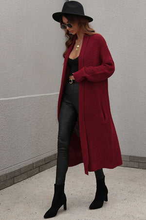 Textured knit maxi cardigan in wine with pockets, open front and long sleeves.