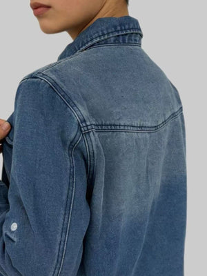 Classic blue denim overshirt with button details and western yoke stitching.