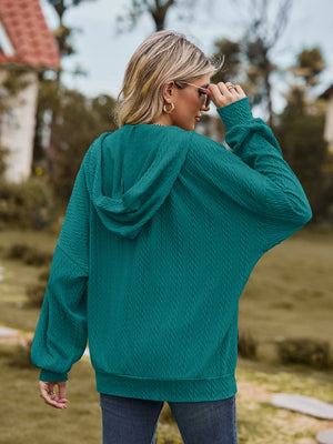 Deep Teal textured knit dolman sleeve hoodie with a cable knit pattern and drawstring hood.