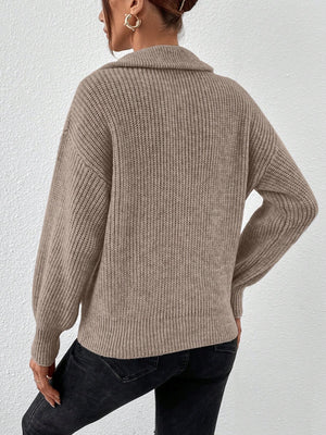 Taupe ribbed collar zip-up knit sweater with balloon sleeves.
