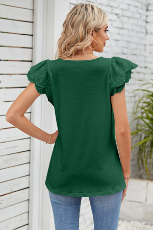 Dark green eyelet flutter sleeve top with a square neckline.