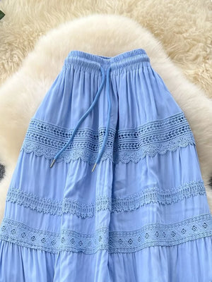 Blue tiered midi skirt with lace trim and drawstring waist