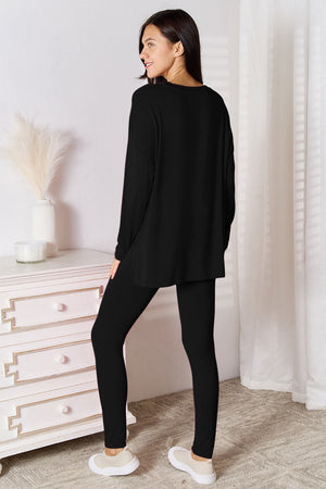 Black loungewear set with long sleeve top and leggings, made from soft bamboo fabric.