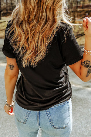 Black t-shirt with short sleeves and a graphic print on the arm.