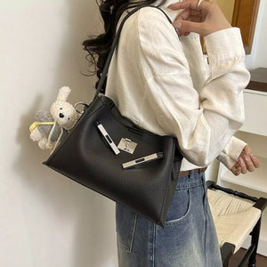Lock Detail Crossbody Bag in Black, model styling view