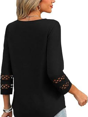 Black 3/4 sleeve t-shirt with cutout detail on sleeves.