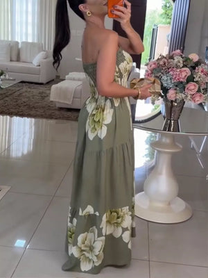 Botanical smocked maxi dress with ruched bodice and floral print.