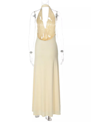 Yellow halter neck ruched maxi dress with plunging neckline and open back.