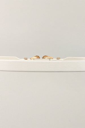 White elastic waist belt with western-style buckle and gold-tone accents