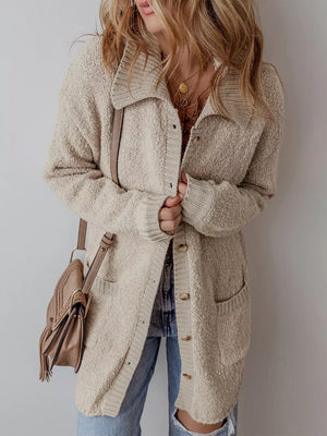 Beige textured button-up cardigan with pockets and a collared neckline.
