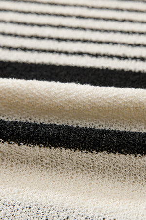 Textured black and white striped knit sleeveless top with a loose weave.