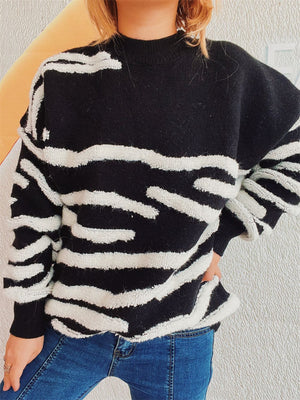 Black and white textured stripe knit crewneck sweater with a relaxed fit.