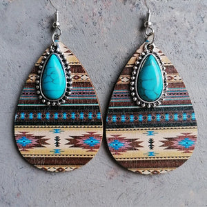 Geo-Turq teardrop dangle earrings with tribal pattern and turquoise stone.