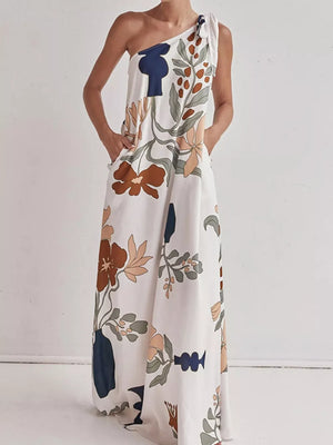 White one-shoulder maxi dress with floral print and pockets
