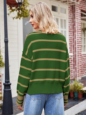 Green acrylic knit sweater with tan stripes and a polo neckline.