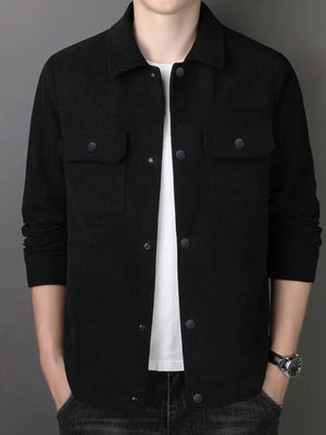 Black corduroy button-down jacket with two chest pockets and button closure.