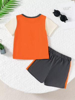 Color block baby set with orange and cream tee and gray shorts with orange stripe detail.