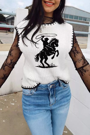 White knit sweater vest with black rodeo graphic and contrast trim, worn over black lace sleeves.