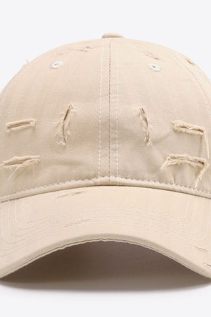 Sand baseball cap with distressed details and white stitching