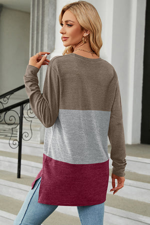 Colorblock long sleeve tee in brown, gray, and burgundy with a side slit hem.