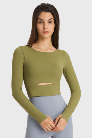 Green crop top with keyhole cutout and thumbhole sleeves
