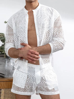 White open-weave crochet resort set with intricate patterns, featuring a button-up shirt and shorts.