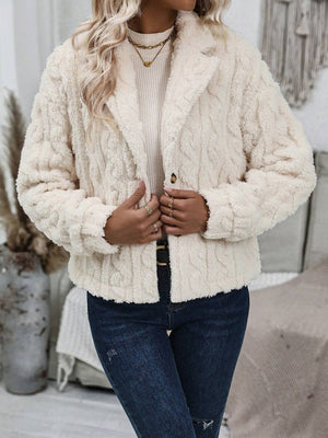 Cream textured teddy bear bolero jacket with button closure and notched lapels.