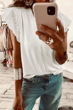 White cotton maternity t-shirt with eyelet flutter sleeves and a v-neck.