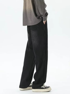 Men's relaxed fit black gradient wash jeans with drawstring waist.
