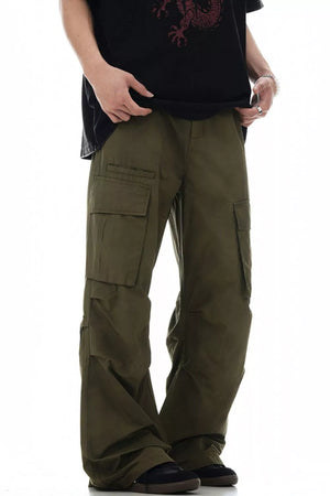 Olive green relaxed fit cargo pants with multiple pockets.