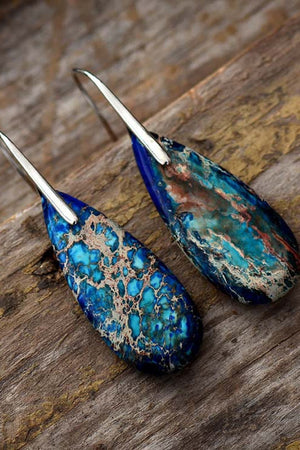 Ocean Jasper dangle earrings in blue/silver with unique marbled patterns.