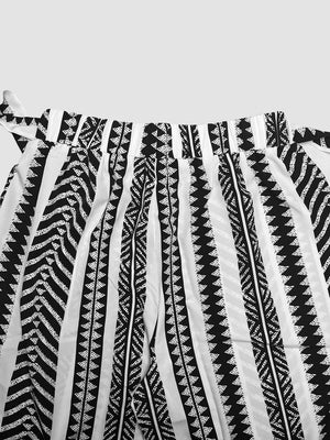 Black and white geometric print maternity pants with adjustable bow detail