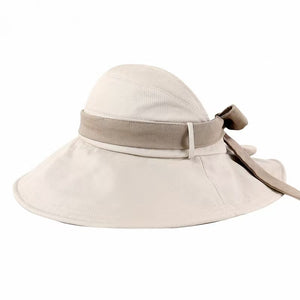 Wide brim sun visor hat in khaki with a taupe band and bow detail