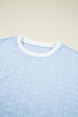 Light blue loungewear set with cable knit texture and white trim neckline