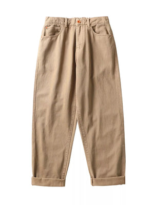 Khaki cotton wide-leg trousers with cuffed hems and front pockets.