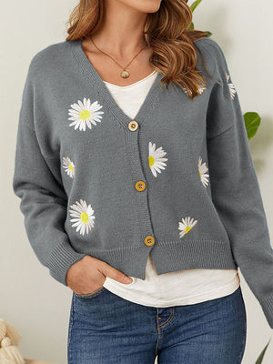 Grey V-neck cardigan with embroidered daisies and button front.