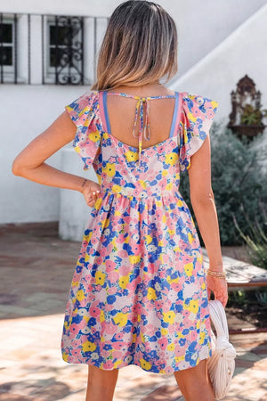 Floral flutter sleeve mini dress with tie back and blue trim.