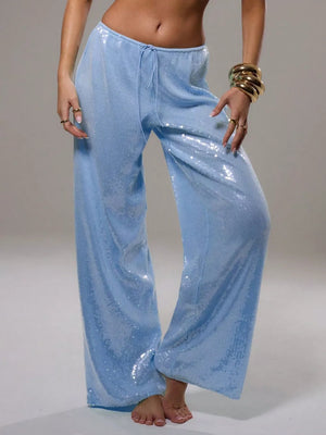 Light blue sequin wide leg pants with drawstring waist and cotton lining.
