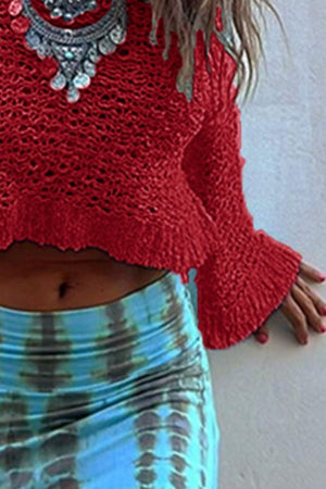 Deep Red asymmetric crochet crop top with bell sleeves and ruffled hem.